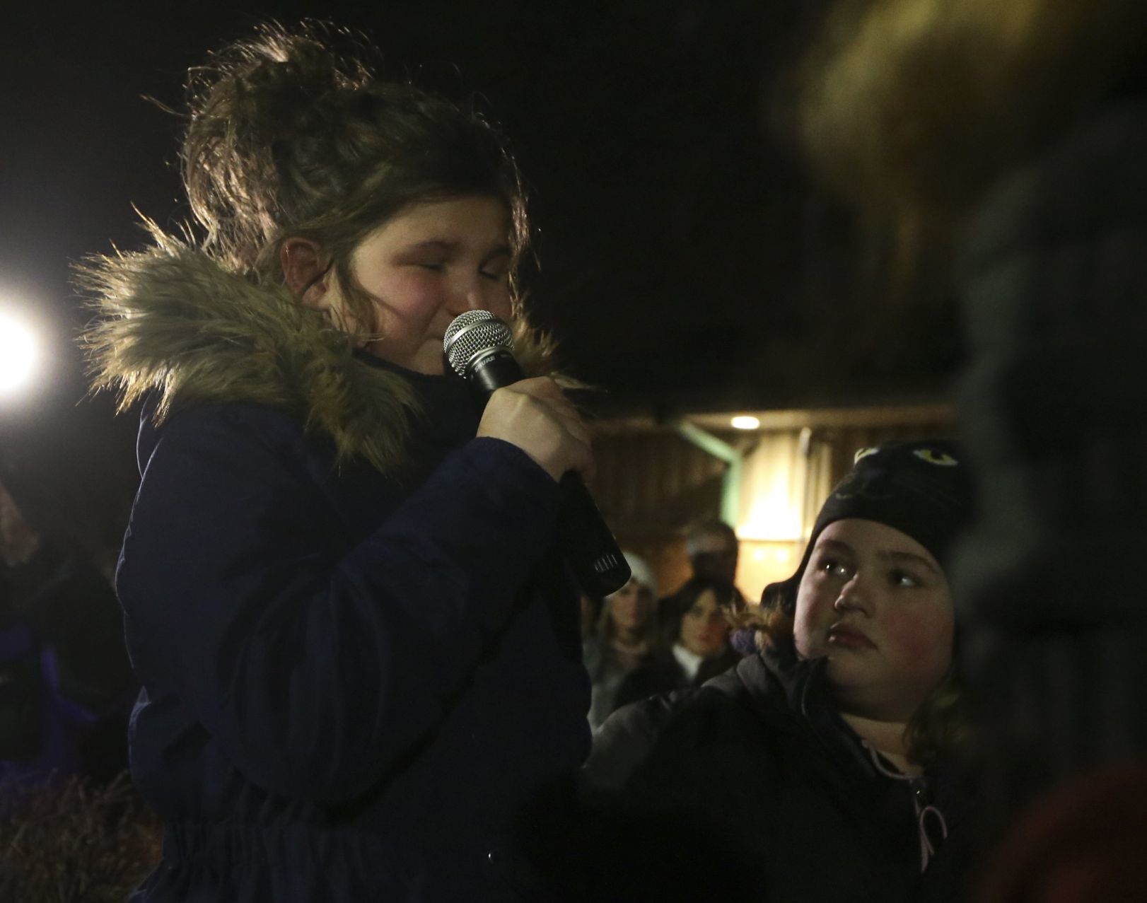 Remembering St. Charles family at candlelight vigil